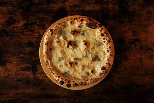 quattro stagioni pizza four seasons mushrooms artichokes