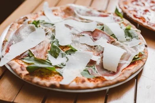 prosciutto pizza arugula parmesan truffle oil